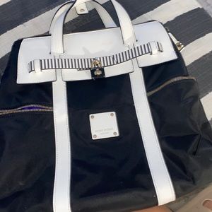 Henri Bendel Jetsetter black and white book bag.